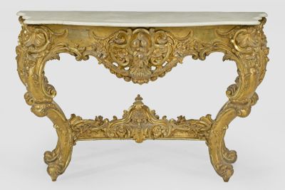 an antique console table with a marble top and gold leaf decoration