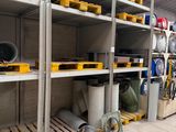 many shelves of different types and sizes in a warehouse