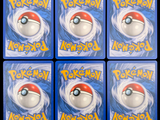 four different images of a pokemon figure in a plastic case