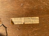 a piece of paper that has been torn off of a piece of wood