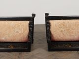 pair of antique chinese carved wood chairs with pink upholstered cushions