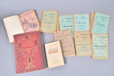 many old books that are sitting on top of a table