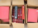 a box full of books that are sitting on the floor