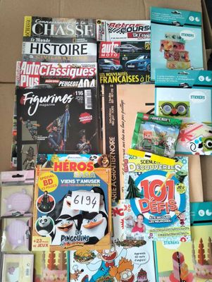 a lot of children ' s books in a box