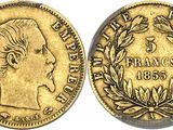 a gold coin with a head of a man and laurels