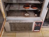 two donuts in the oven on the counter