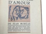an old book with a picture of a man and a woman on it