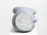 a sculpture of a hand that is sitting on top of a box