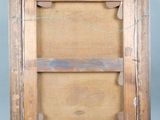 an old picture frame with a wooden shelf on a blue background
