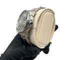 a person holding a watch in their hand on a white background