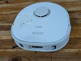 a small white device on a wooden table