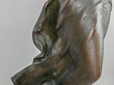 statue of a woman holding a baby in her arms