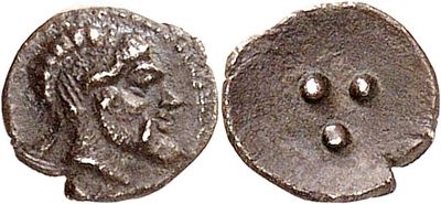 a silver coin with a head of a man and a face of a woman