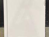 an image of a white refrigerator with a blue sticker on it