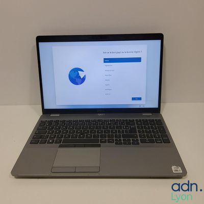 an open laptop computer sitting on top of a white table