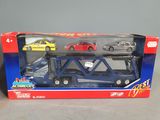 a toy truck with a car on the back of it