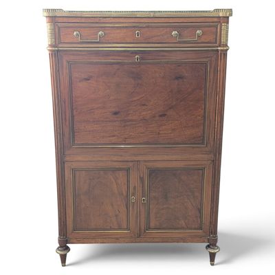 an image of a wooden cabinet with drawers and a door