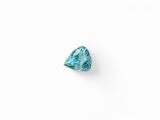 a trillion cut blue diamond on a white background