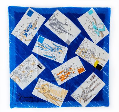 un morceau de papier bleu sur lequel sont dessinés des motifs