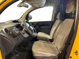 a yellow car that is sitting in the back of the car
