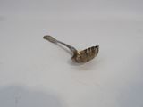 a spoon that has been left on the table