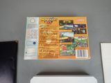 a nintendo wii game sitting on a table next to a nintendo wii