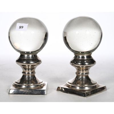 pair of silver plated salt and pepper shakers on stands