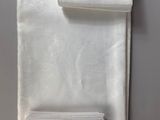 a close up of a towel and a napkin on a table