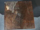 a piece of wood that has been peeling off of it