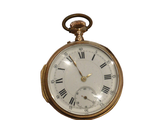 a gold pocket watch with roman numerals on it