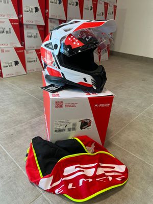 a helmet on top of a box on the floor