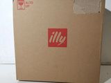a cardboard box with a sticker on it sitting on a table