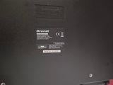 the back of a laptop with a black cover and a red keyboard