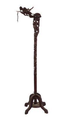 an image of a wooden floor lamp with a bird on it