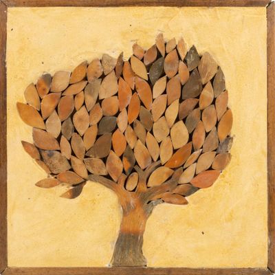 an image of a picture of a tree made out of leaves