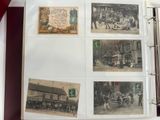 several old photos of people and horses are displayed in a binder