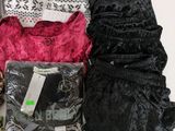 many different types of underwear on a white table