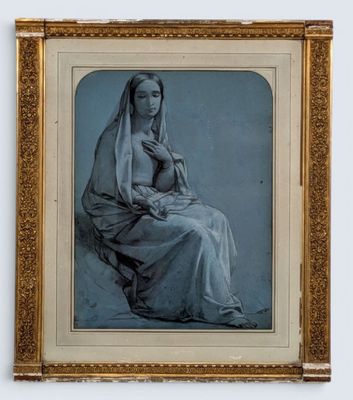 an old picture of a woman sitting in a chair with a veil on her head