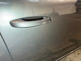 a close up of a door handle on a car
