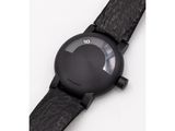 an image of a close up of a wrist watch on a white surface