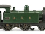 a toy train that is sitting on the tracks