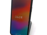 the back view of a black iphone x with the display on it