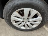 a close up of a tire on a car