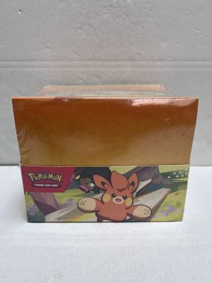 une boîte sur laquelle figure l'image d'un personnage de Pokémon