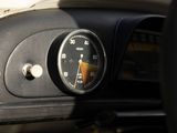a close up of a speedometer on a car dashboard