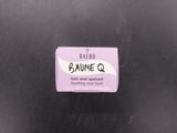 a close up of the label on the back of a black bag