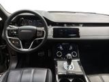 the interior of a car with a steering wheel, dashboard, and dashboard controls