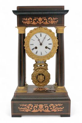a clock that is sitting on top of a table