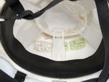 a close up of a helmet with a strap on it