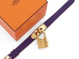 a close up of a purple belt with a padlock on it